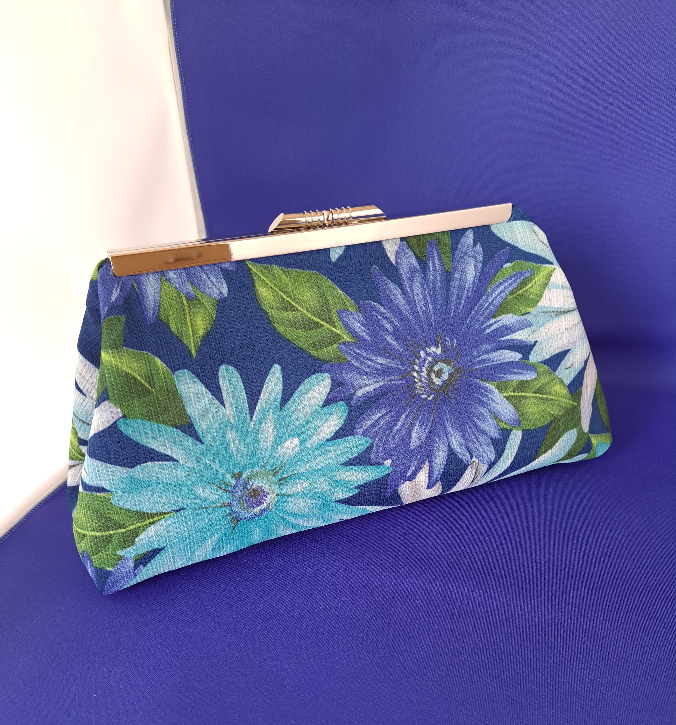 Navy floral clutch bag new arrivals
