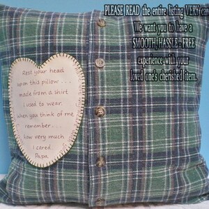 May include: A green and blue plaid pillow with a heart-shaped patch sewn on. The patch has a handwritten message that reads "Rest your head upon this pillow... made from a shirt I used to wear. When you think of me remember... how very much I cared. Papa."