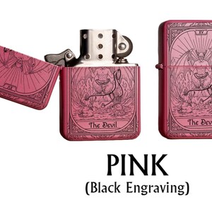 May include: Pink metal lighter with a black engraved tarot card design featuring "The Devil" on the front and back. The lighter is shown open and closed. The text "PINK" and "(Black Engraving)" are at the bottom.