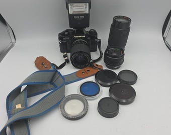 Olympus OM PC 35 mm systemkamera med 35-75 mm objektiv, oprövad, returrätt med tillbehör