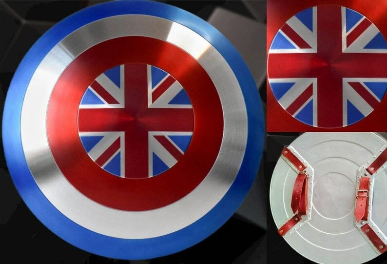 May include: A round shield with a blue, silver, and red design. The center features a Union Jack flag. The shield has a metallic finish and red leather straps on the back. The shield is a replica of a superhero's shield.