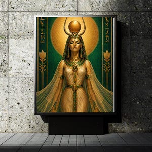 May include: A framed artwork depicting an Egyptian queen. The image shows a woman in a gold dress and headdress, set against a green and gold backdrop. The artwork is framed in black and mounted on a black base.
