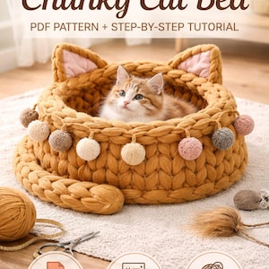 Puede incluir: Una cama para gatos hecha a mano, de ganchillo grueso, en un cálido color marrón dorado. La cama presenta detalles de orejas de gato y está adornada con pompones. La imagen incluye el texto "Chunky Cat Bed" y "PDF Pattern + Step-by-Step Tutorial". Un gato esponjoso está dentro de la cama.