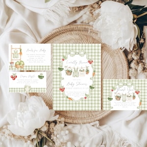 a set of baby shower invitation cards with a green and white checkered pattern, surrounded by flowers and a woven basket.