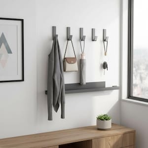 May include: A set of three ceramic mugs with a speckled, matte finish. The mugs are in shades of cream, light gray, and dark gray. Each mug has a simple, minimalist design and a rounded handle.