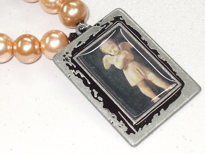 Angel baby necklace set.