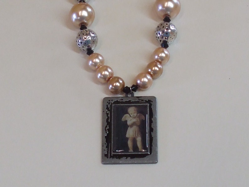 Angel baby necklace set.