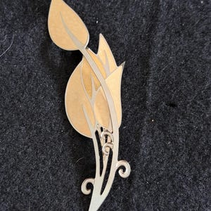 vintage Edgar Berebi signed enamel leaf brooch pin featuring a silver-tone and gold-tone finish