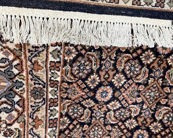 Hand-knotted wool Persian-style rug with Herati pattern