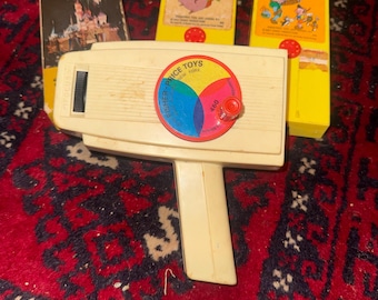 Vintage Fisher-Price Movie Viewer #460 with 3Walt Disney  cartridges