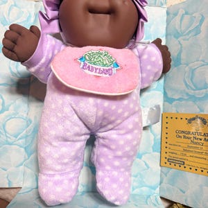 Vintage 1987 Cabbage Patch Kids Babyland Doll, African American Rattle Doll with Original Box Packaging & Birth Certificate "Nancy" Teal Sig