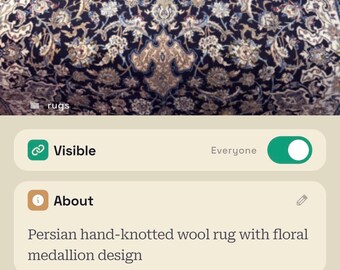 Handmade wool and silk Oriental rug with floral medallion design