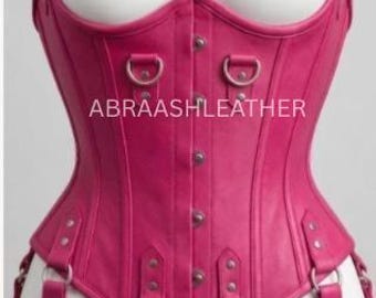 Top corsé de piel de oveja rosa, corpiño con tirantes y detalles de hebilla.