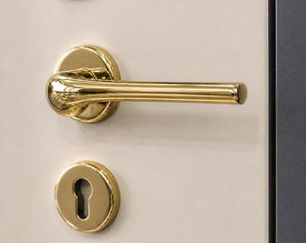 Manilla moderna para puertas interiores con cerradura de cilindro, fabricada en latón macizo, con un lujoso acabado pulido para puertas interiores y exteriores.