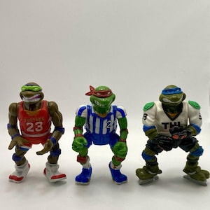 Vintage 1991 TMNT Shell Kickin’ Raph Slam Dunkin’ Don (Red) Slap Shot Leo