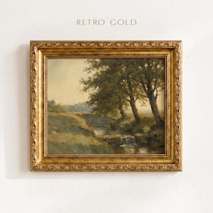 May include: A landscape painting in a decorative, ornate gold frame with the text RETRO GOLD above it. The artwork depicts a stream flowing through a grassy field with trees under a soft sky. The frame features intricate, embossed leaf patterns.