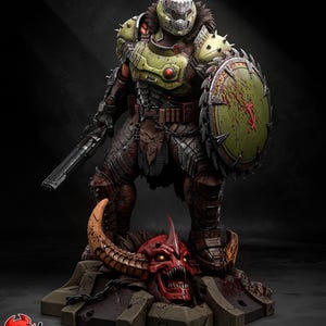 May include: A detailed figurine of a warrior in green and metallic armor, holding a serrated shield and a firearm. The figure stands on a base featuring a red horned skull with glowing eyes. The text "PATREON h3LLcreator" appears at the bottom.