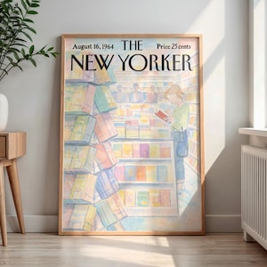 May include: A framed vintage New Yorker magazine cover from August 16, 1964, featuring a watercolor illustration of a person reading in a bookstore. The cover art has a warm color palette and is displayed in a wooden frame.