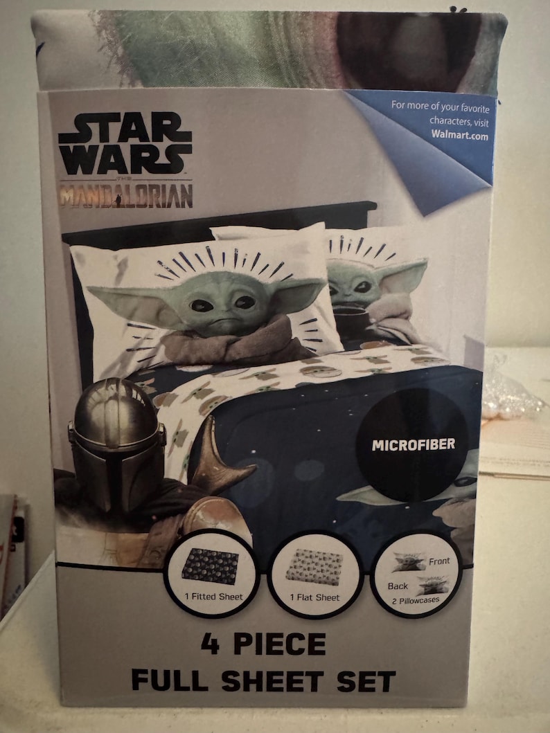 May include: A Star Wars Mandalorian 4-piece full sheet set. The set includes a fitted sheet, flat sheet, and two pillowcases. The design features the character Grogu, also known as Baby Yoda, and the Mandalorian helmet. The set is made of microfiber.