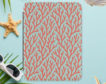 Funda para Kindle Paperwhite con diseño de arrecife de coral en tonos verde azulado y naranja.