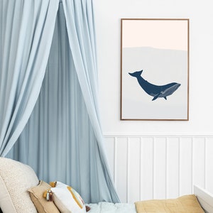 May include: A light blue canopy bed with a white and yellow patterned pillow and a mustard yellow quilt. A framed print of a blue whale is hanging on the wall above the bed.