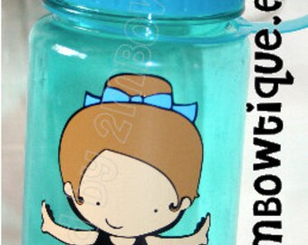 May include: A turquoise blue water bottle with a clear lid and a sticker of a cartoon ballerina wearing a black leotard and a blue tutu. The sticker also includes the text "www.2mbowtique.etsy.com".