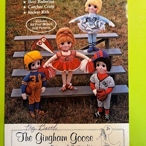 May include: A vintage sewing pattern for four 22-inch dolls. The pattern is titled "Four Friends" and includes a cheerleader, ballerina, baseball catcher, and kicker. The pattern is from The Gingham Goose, Patterns & Pretties, Inc. and is copyrighted 1980.