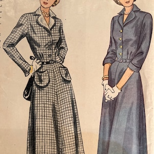 May include: Vintage sewing pattern for a dress with a collared neckline and long sleeves. The pattern shows two women wearing the dress, one in a plaid fabric and the other in a solid blue fabric. The pattern is for sizes 18 and 36.
