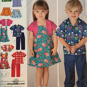 May include: A sewing pattern for children's clothing featuring a Mickey Mouse theme. The pattern includes a dress, a skirt, a shirt, a vest, and pants. The pattern is printed on white paper with black text and images.