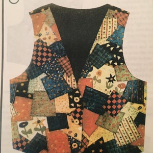 May include: A patchwork vest with a variety of colors and patterns, including blue, green, orange, and yellow. The vest has a V-neck and is made of a quilted fabric. The vest is called "Country Cousin Vest".