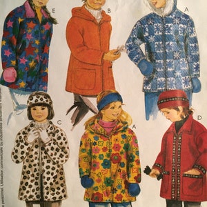 May include: A sewing pattern for children's coats. The pattern includes five different styles: a red coat with a hood, a blue and white plaid coat with a fur trim, a leopard print coat, a floral print coat, and a star print coat. The pattern is called "PolarGEAR" and includes instructions for sizes 7-24-13.