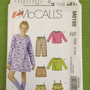 2010 Childs/Girl’s Pullover Tops, Gown, Shorts, Pants and Leg Warmers - McCall’s Pattern M6195