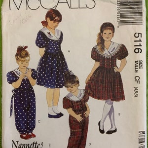 Puede incluir: Un patrón de costura para ropa de niños, que incluye un mono de cuadros, un vestido de lunares y un mono de lunares. El patrón es de McCall's y es de talla 4, 5 o 6. El patrón se llama Nannette.