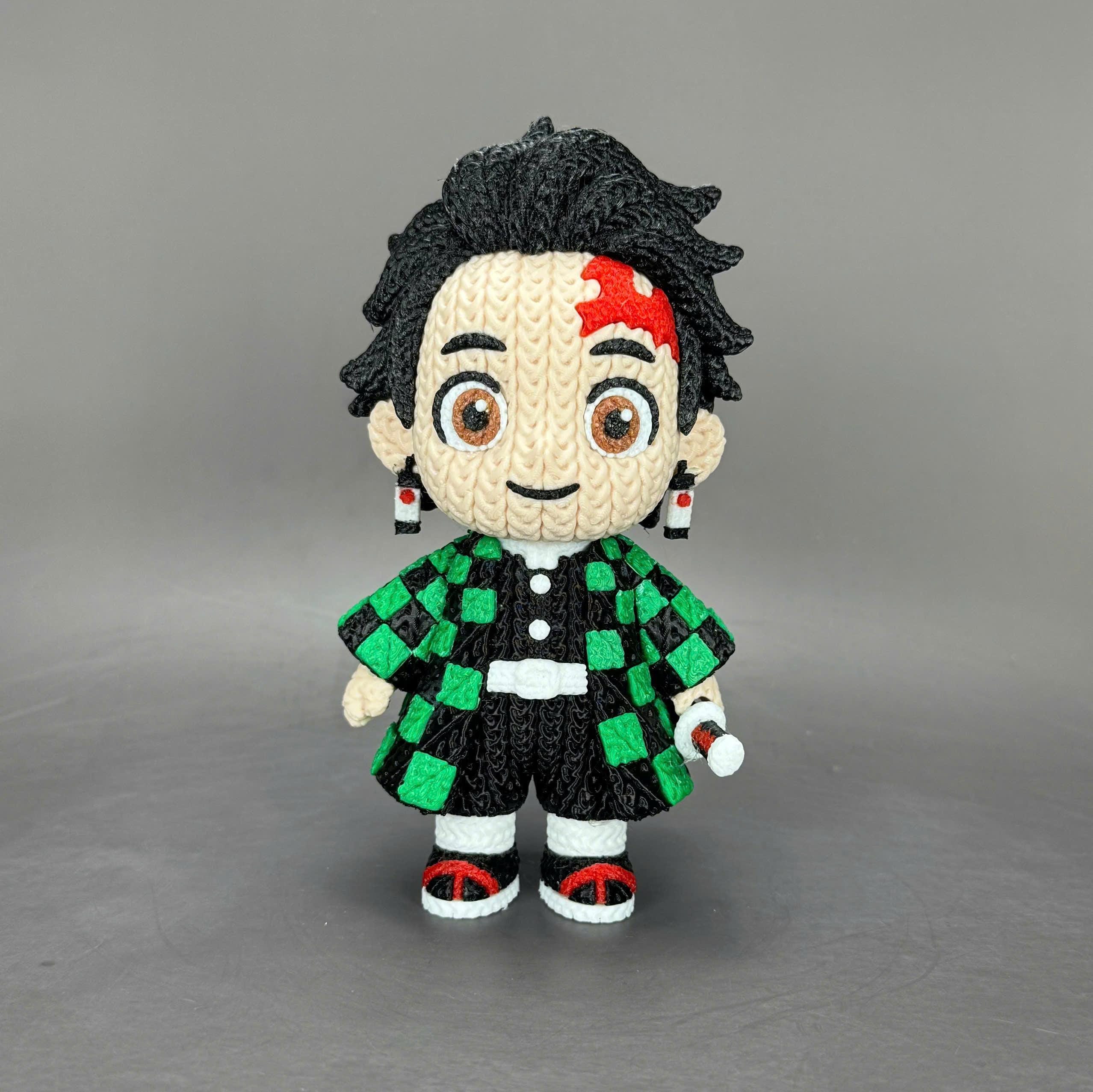 Checkered Cape Swordsman 3D Printed Figure | Crochet-Style Warrior Collectible | Office Decor | Gamer Gift — photo 1 of 7