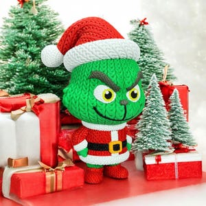 May include: A green Grinch figurine wearing a red Santa suit and hat with a white trim. The Grinch has yellow eyes and a mischievous grin. The figurine is surrounded by wrapped red and white gifts and miniature Christmas trees.