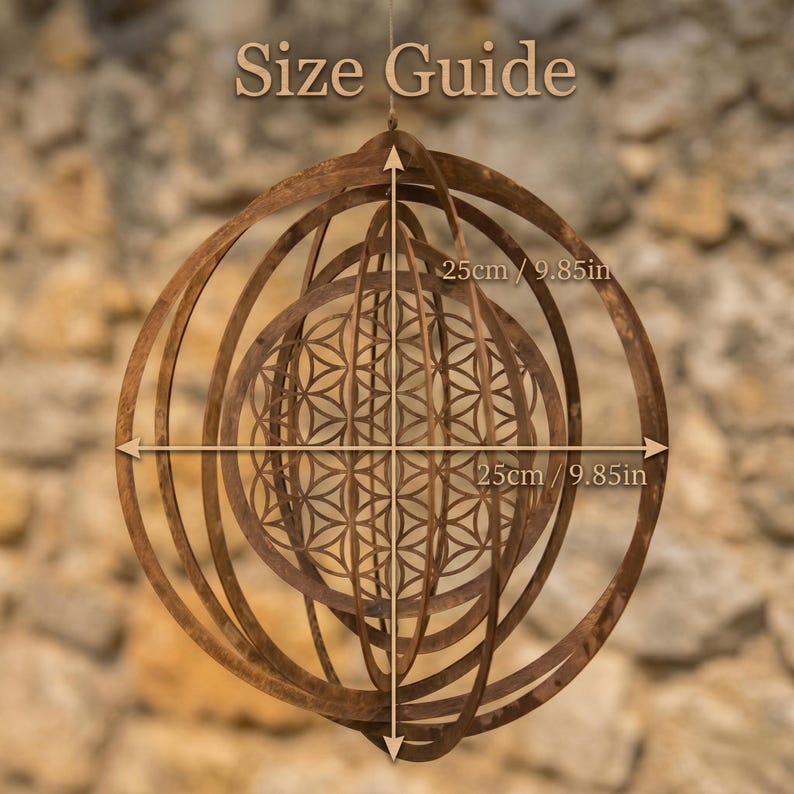 May include: A brown metal decorative hanging sculpture with a geometric design. The sculpture features concentric circles and a central pattern. The text "Size Guide" is at the top, with dimensions of 25cm/9.85in.