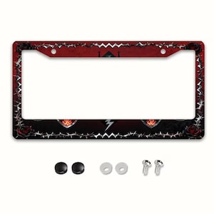 May include: A rectangular license plate frame featuring a dark red and black background with a border of silver barbed wire and black roses. The design includes two heart-shaped emblems with flames and a central lightning bolt. Includes mounting hardware.