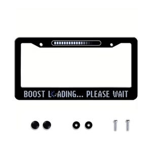 May include: A black rectangular license plate frame featuring a white pixelated loading bar at the top and the text "BOOST L-ADING... PLEASE WAIT" at the bottom, with a loading icon replacing the letter O. Includes two black caps, two washers, and two screws.
