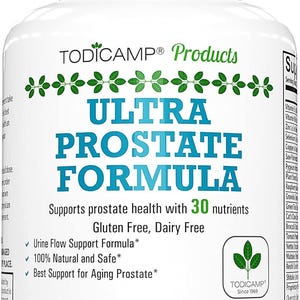 May include: White bottle of Ultra Prostate Formula dietary supplement. The label features the text "ULTRA PROSTATE FORMULA" in blue, supporting prostate health with 30 nutrients. It is gluten-free and dairy-free, with 60 capsules.