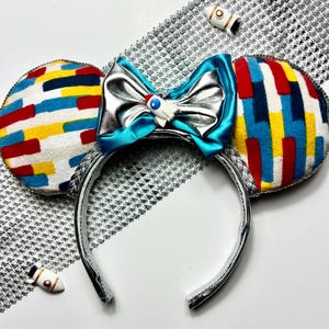 Op Disney Astro Orbiter Tomorrowland geïnspireerde Minnie Mouse-oren