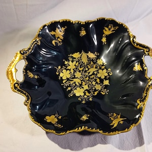 May include: A set of three ceramic mugs with a speckled, matte finish. The mugs are in shades of cream, light gray, and dark gray. Each mug has a simple, minimalist design, perfect for coffee or tea.