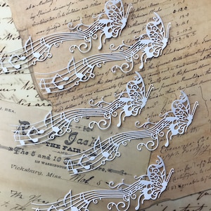 Juego de 4 troqueles de papel, adorno de mariposa con notas musicales para scrapbooking, tarjetas, manualidades y diarios basura.