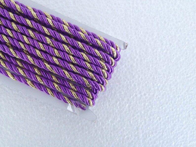curtain cord/_ 1 meter 5 mm 3 ply purple and gold twist rope