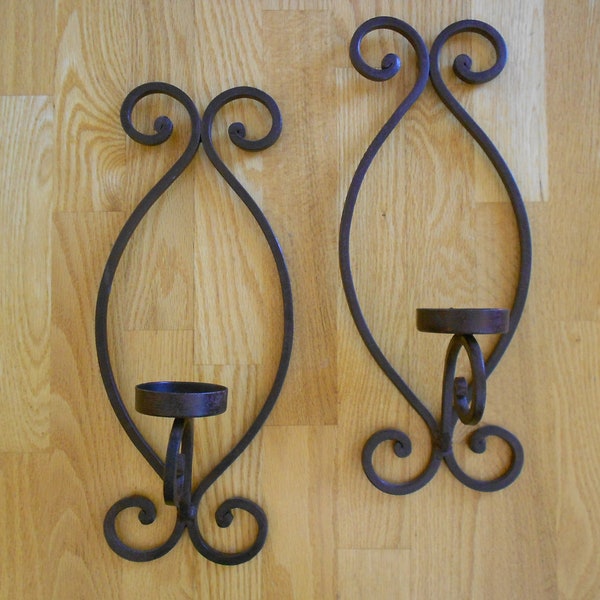 Vintage cast iron candle sconces.  Metal wall art, candle holders.  Black home decor.