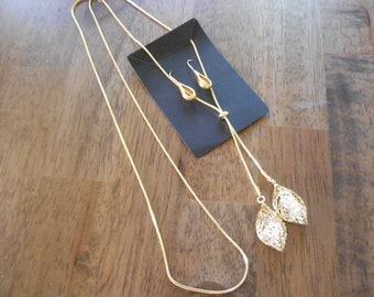 Vintage gold and crystal necklace and earrings.  New old stock gold jewelry.  Free shipping.