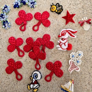 Vintage appliques.  Frog closures.  Floral patches and appliques.  Lot of vintage sewing accessories.