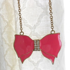 Vintage rhinestone bow necklace.  Long gold necklace.  Statement necklace.