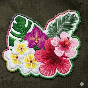 May include: Embroidered floral patch featuring a vibrant arrangement of tropical flowers. The patch includes a pink hibiscus, purple orchid, white and yellow plumeria, and green monstera and palm leaves, all outlined in white and green.
