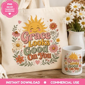 Könnte beinhalten: Eine cremefarbene Stofftasche und eine weiße Keramiktasse, beide mit einer Grafik aus einer lächelnden Sonne, bunten Blumen und dem Text "Grace Looks Good On You" in einer Retro-Schriftart. Das Design enthält florale Akzente in Rosa, Gelb und Grün.
