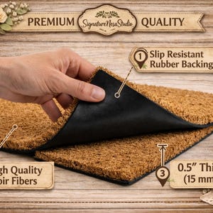 Puede incluir: Una alfombra rectangular hecha de fibras de coco marrones, con un respaldo de goma negro. La alfombra tiene 15 mm de grosor y presenta el texto "High Quality Coir Fibers" y "Slip Resistant Rubber Backing". La marca "Signature Mesa Studio" tambi&eacute;n es visible.